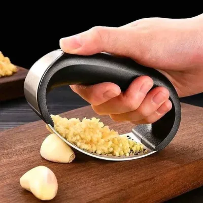 Garlic press rocker